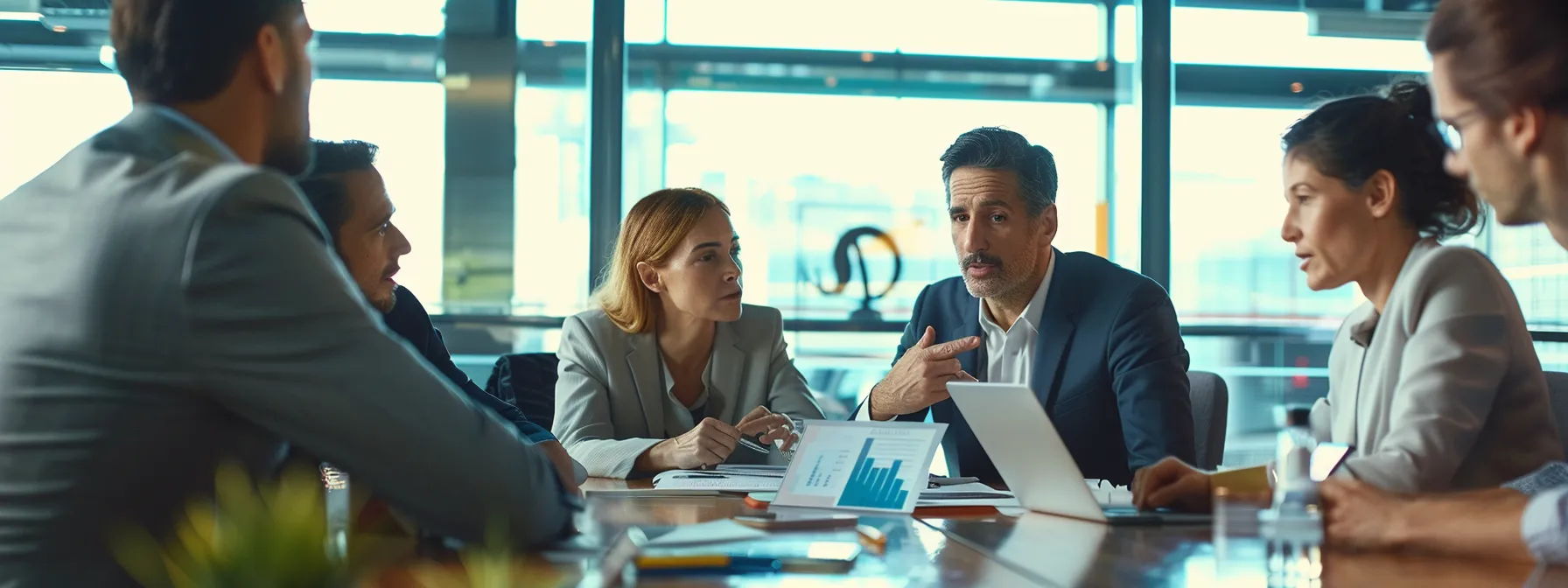 business professionals engage in a focused discussion around a digital marketing strategy.