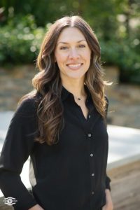 a woman smiling for the picture